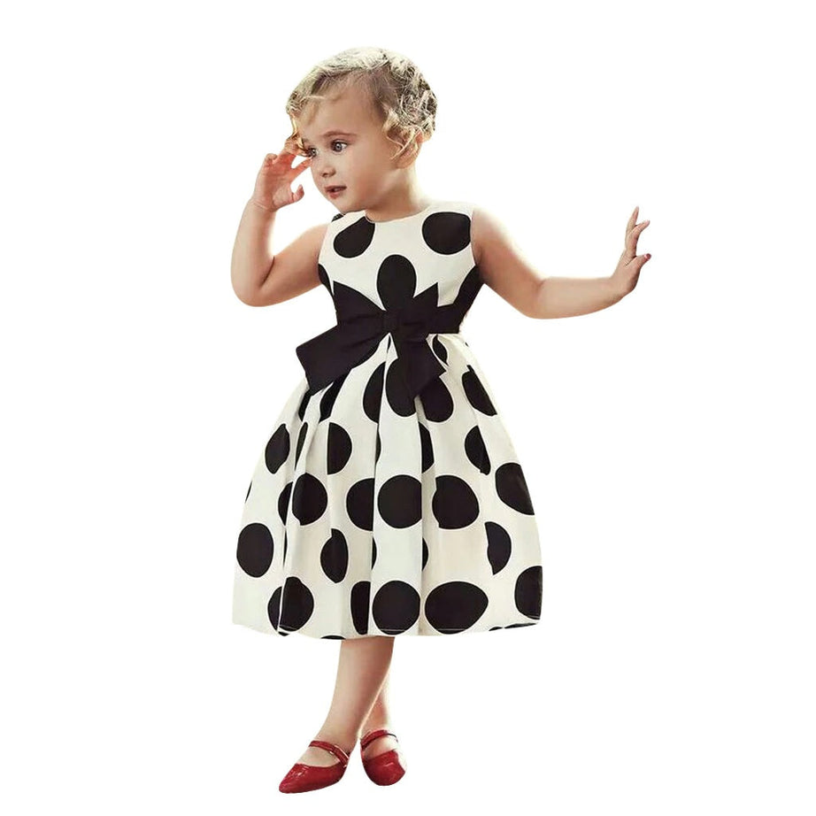 Weißes Vintage-Kleid mit großen schwarzen Tupfen für Kinder