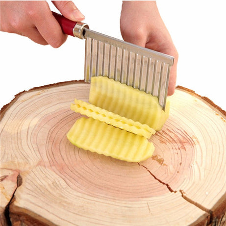 Stainless steel knife with wavy blade for slicing potatoes